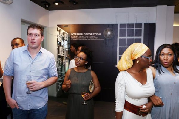 Jonathan Millard & Other Guests Entering the Exhibition