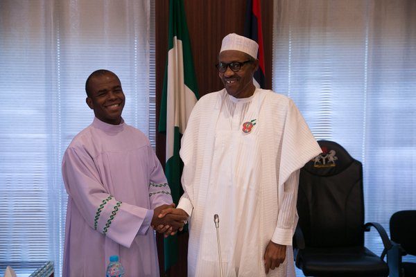 President Buhari (R) and Father Mbaka (L)