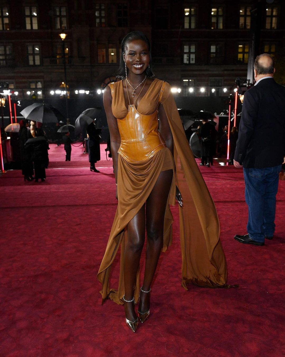 Adut Akech Lights Up the Red Carpet in Custom Knwls at the 2023 Fashion Awards